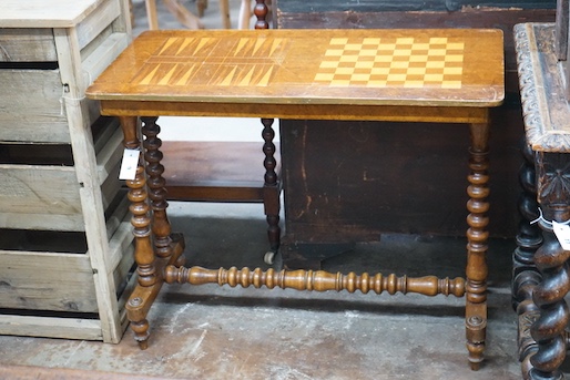 A Victorian inlaid rectangular walnut games table with chess and backgammon surface, width 87cm, depth 43cm, height 69cm